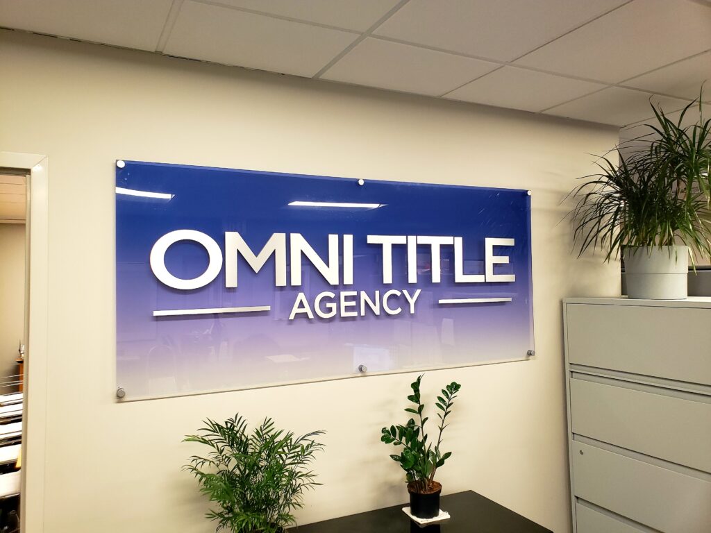 Acrylic panel lobby signs for title companies in Manhattan NY